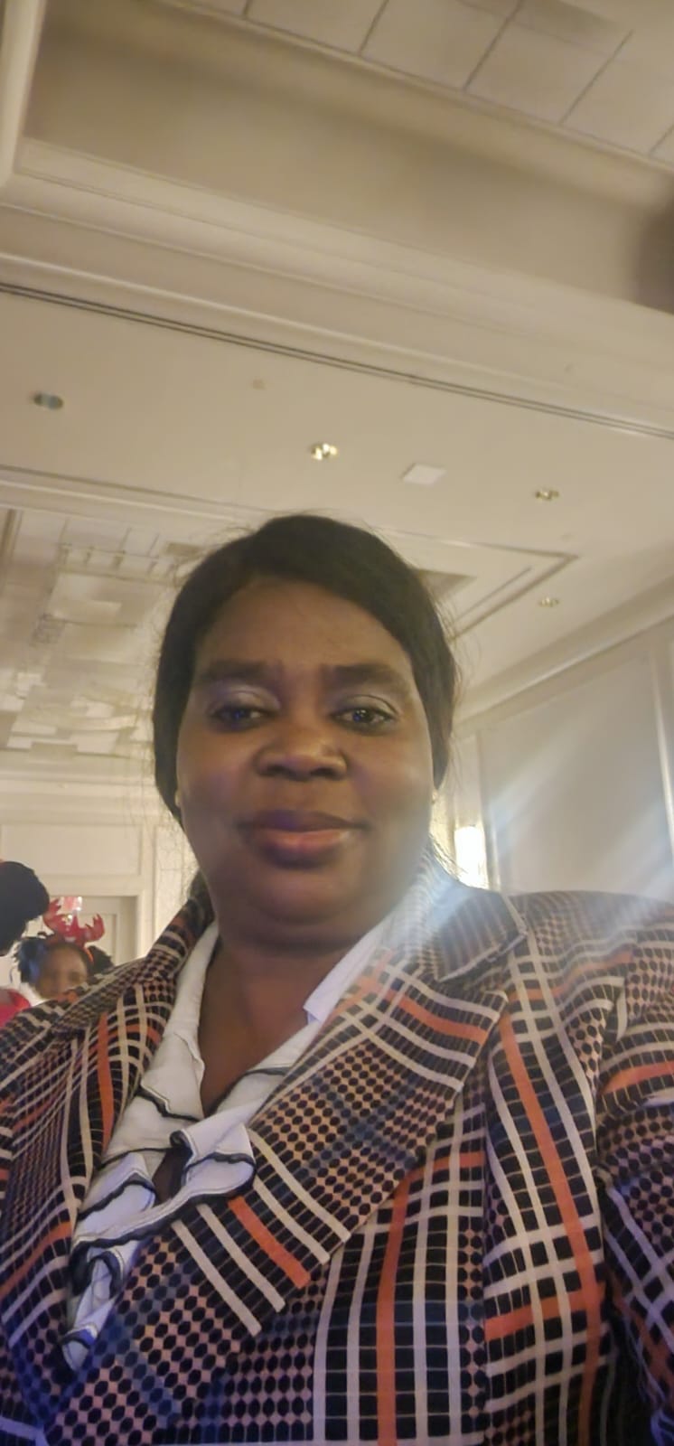 Queen Hair Braiding owner portrait